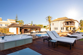 Fabulous coastal villa with heated pool and private golf course