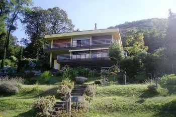 The modern house on the lake Monate